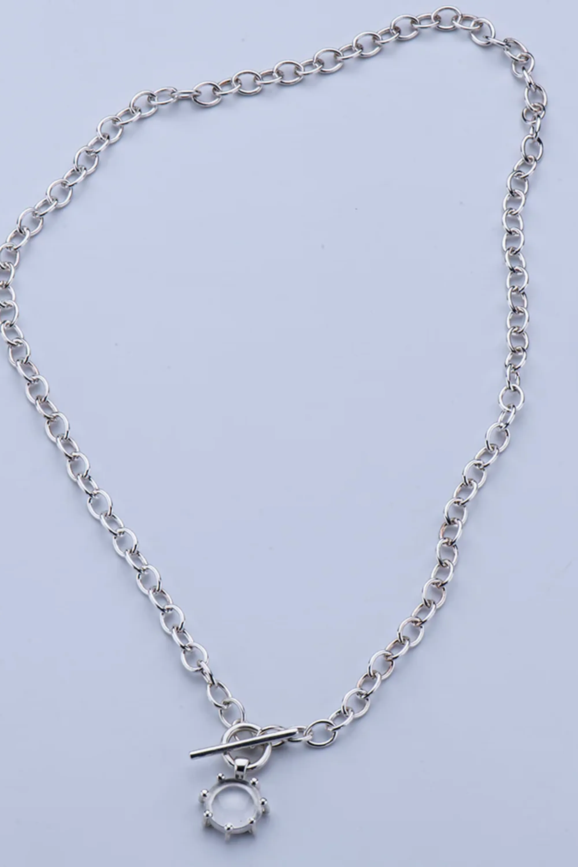 CRYSTAL QUARTZ TOKEN NECKLACE