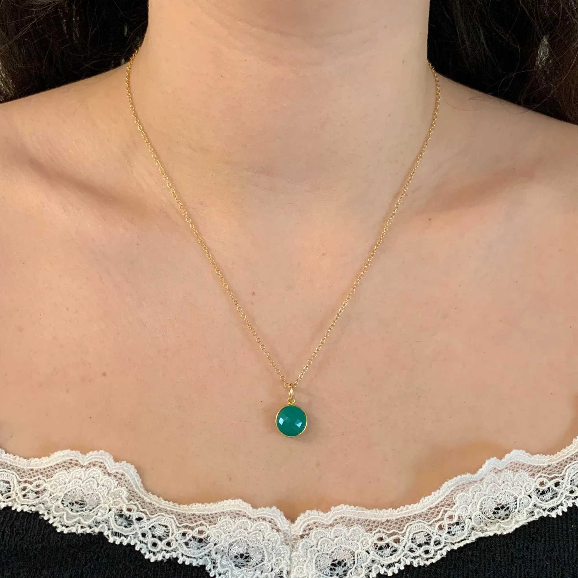 Gemstone necklace with green onyx crystal pendant on gold cable chain