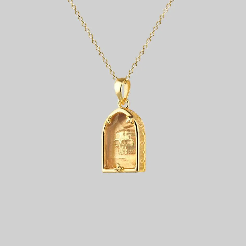 OMINOUS. Skull Under Glass Necklace - Gold