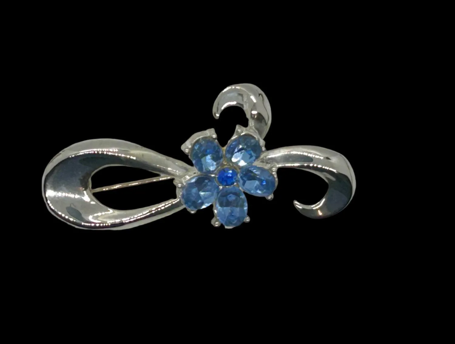 Vintage Silver Bow Brooch with Blue Stones